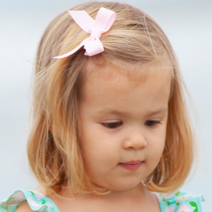 little girl wearing Blush Bitty Bow
