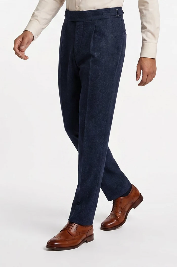 Men's Blutailor Navy Blue Herringbone Trousers crafted from premium fabric, featuring a rich navy blue herringbone weave, high-waisted Gurkha-style waistband with side adjusters, double-pleated front, tailored fit, and a sophisticated silhouette ideal for formal, business, and smart-casual dressing.