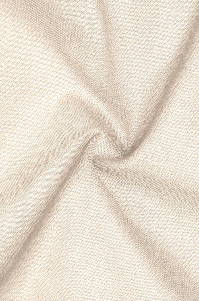 Close-up of beige fabric with folds