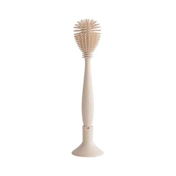 Mushie® Silikonska krtačka za čiščenje Shifting Sand Mushie