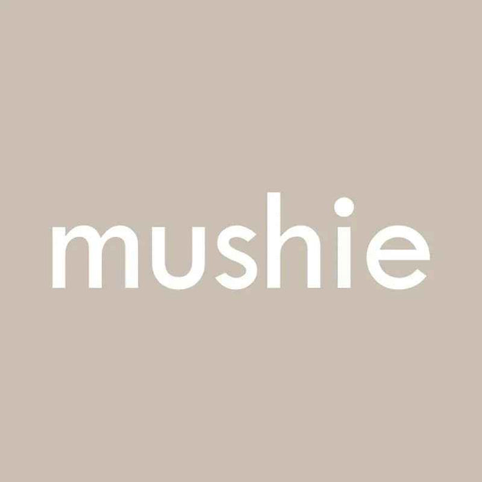 Mushie® Silikonska krtača za odstranjevanje lusk 2 kosa Natural/Cambridge Blue Mushie