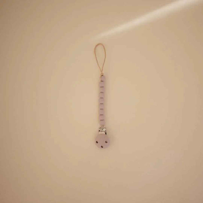 Mushie® Držalo za dudo Hera Soft Lilac Mushie