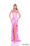 A model wears a strapless, sparkly Bright Pink gown with a high slit and ruffled skirt, standing against a white backdrop.